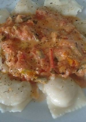 Una foto de Sorrentinos con salsa rosa Express