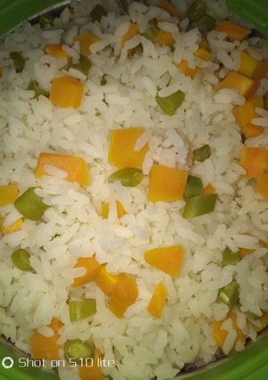 A picture of White rice with veggies.