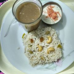 A picture of Cardamom rice, Musk melon and sapodilla juice.