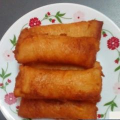 A picture of #Holi2022 Paneer bread rolls.
