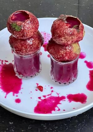 A picture of Dragon Fruit Pani Puri.