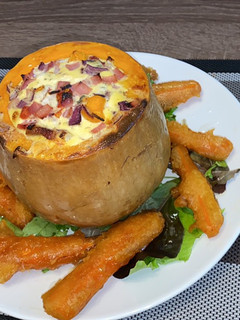 Una foto de Calabaza rellena con zanahoria rebozada en cerveza con miel