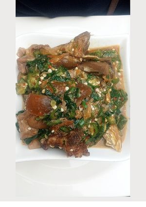 A picture of Okro soup with goat meat.