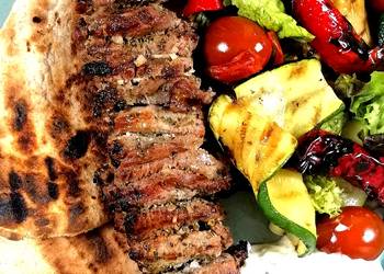 Fresh, Making Recipe Lamb Souvlaki with grilled vegetables salad and tzatziki sauce Delicious