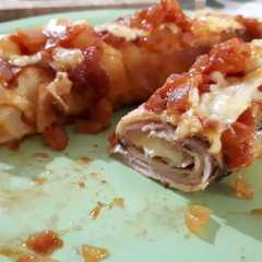 Una foto de Canelones de jamón y queso