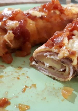 Una foto de Canelones de jamón y queso