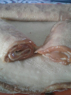 Una foto de Panqueques rellenos con dulce de leche