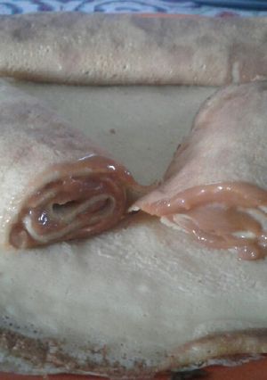 Una foto de Panqueques rellenos con dulce de leche