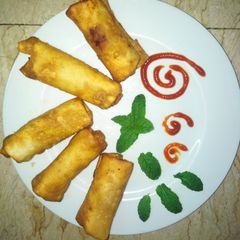 A picture of Chicken vegetable rolls.