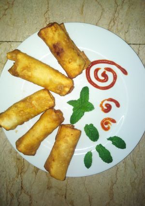 A picture of Chicken vegetable rolls.