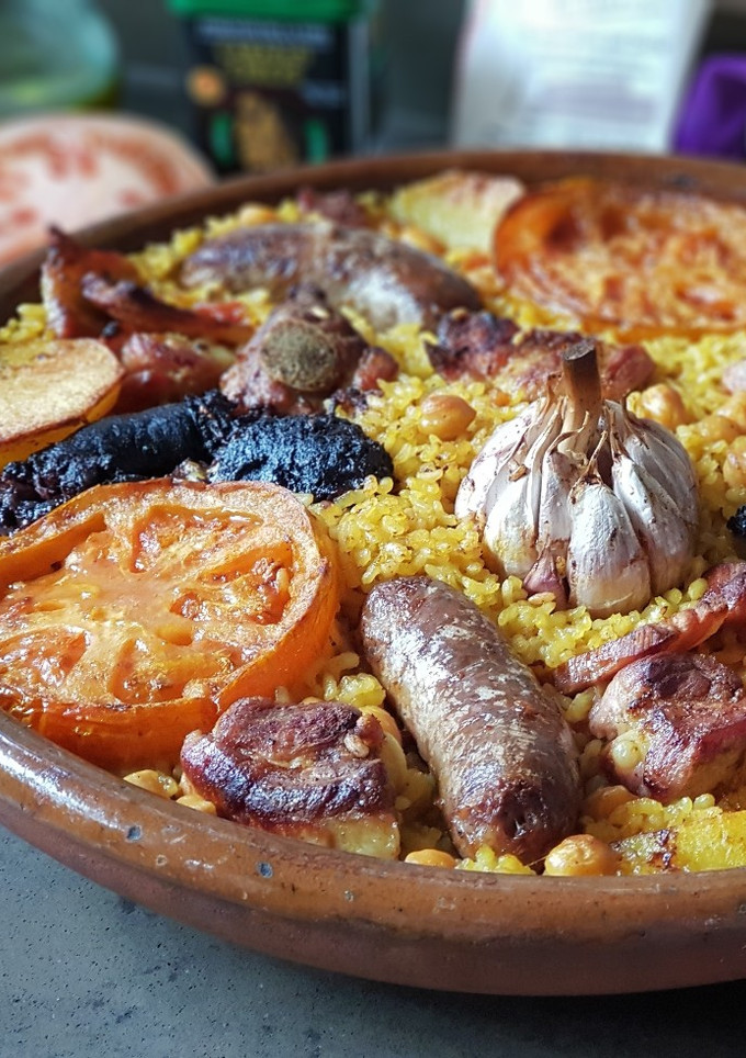 Una foto de Arroz al horno (con morcilla de cebolla y blanquet)
