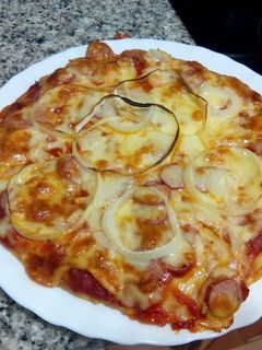 Una foto de Torti-Pizza