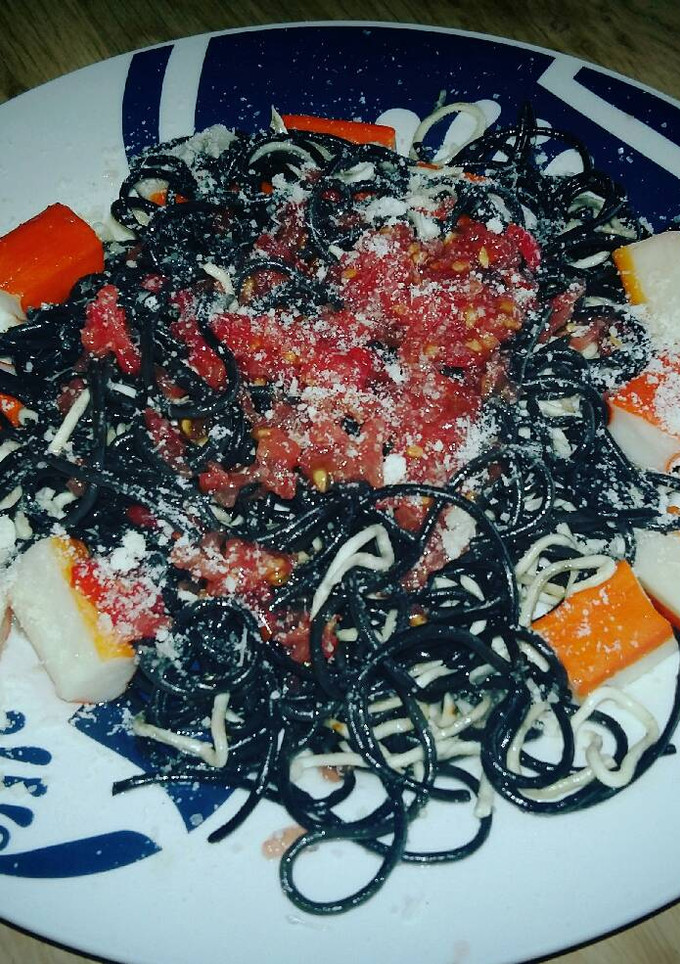 Una foto de Spaguetti nero di sepia con anguriñas