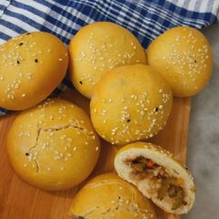 A picture of No Oven Eggless Stuffed Sesame Bun.