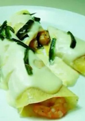 Una foto de Crepas de camarones