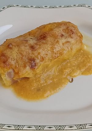 Una foto de Puerros con bechamel de zanahoria