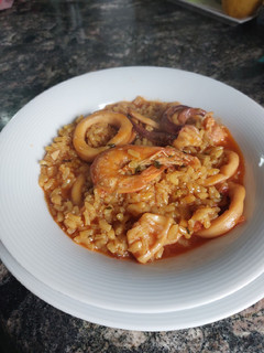 Una foto de Arroz marinero meloso