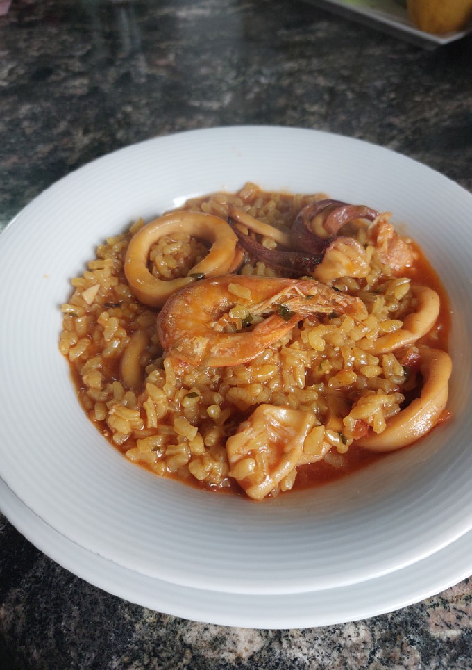 Una foto de Arroz marinero meloso