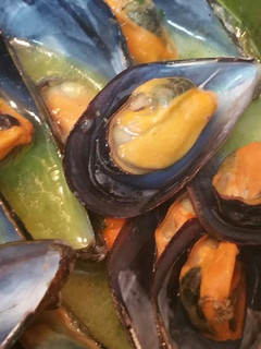 Una foto de Mejillones en salsa verde