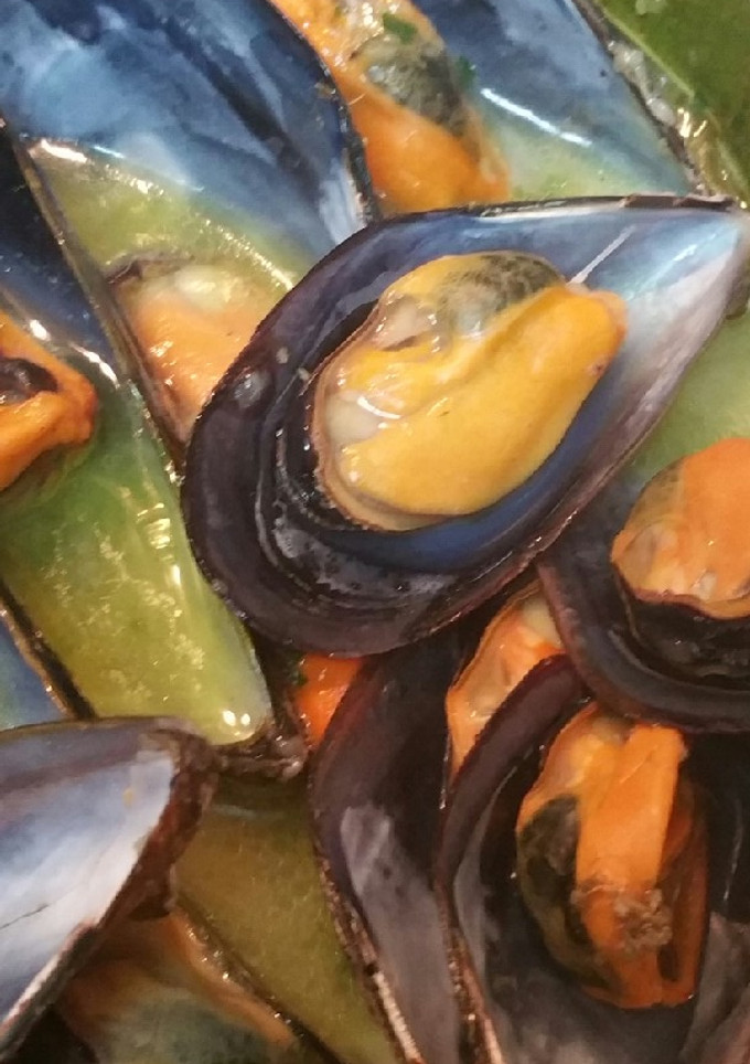 Una foto de Mejillones en salsa verde