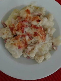Una foto de Coliflor con bechamel y bacon