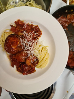 A picture of Spaghetti with roasted tomato and mushroom sauce.