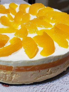 Una foto de Cheesecake 3 capas de durazno. Sin tacc!