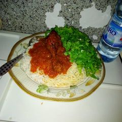 A picture of White rice and stew.