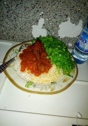 A picture of White rice and stew.