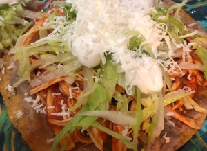 Una foto de Tostadas de tinga