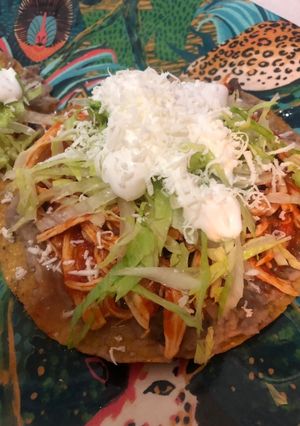 Una foto de Tostadas de tinga