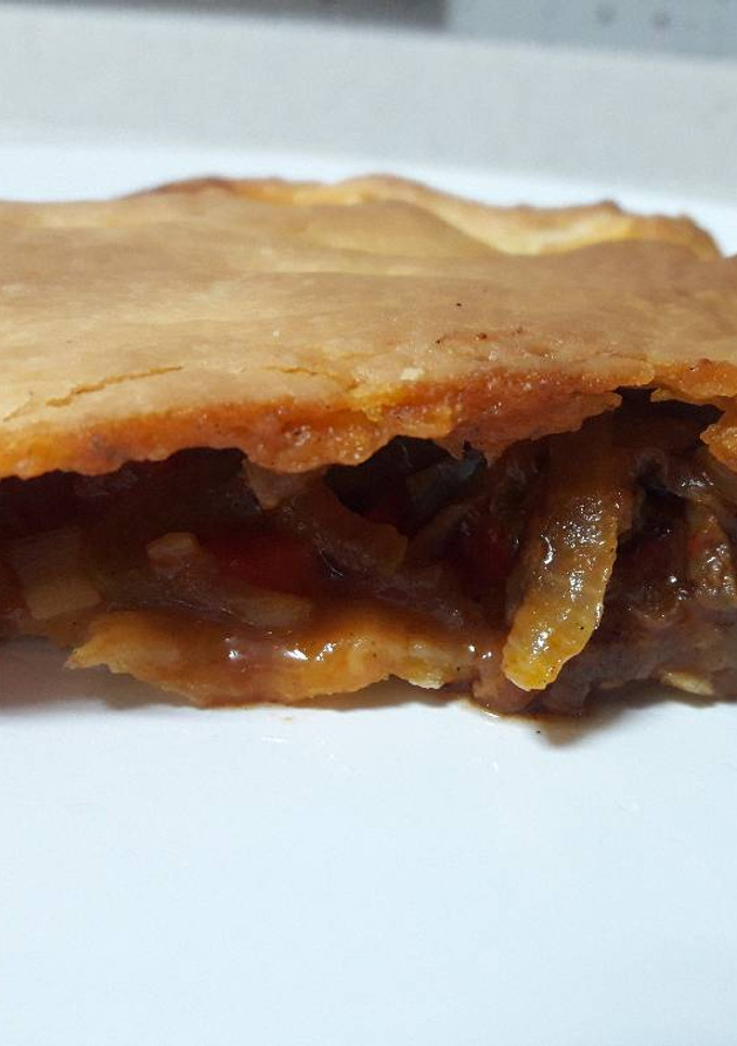 Una foto de Empanada de zamburiñas en salsa de vieiras🤗