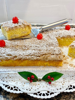 Una foto de Pastel de mantequilla, naranja y plátano, con cobertura crujiente