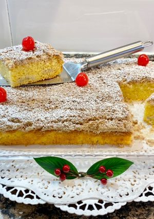 Una foto de Pastel de mantequilla, naranja y plátano, con cobertura crujiente