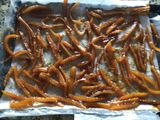 Pieles de naranja confitada