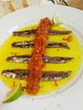 Anchoas con confitura agridulce de pimiento rojo