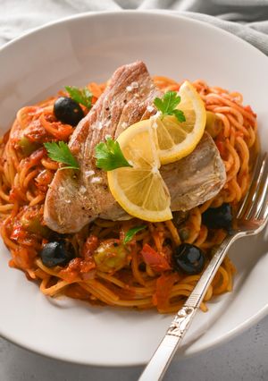 A picture of Spaghetti Puttanesca With Seared Tuna Steak.