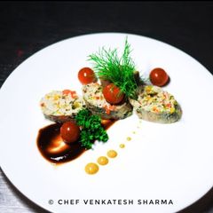 A picture of Chicken Roulade with lemon mustard sauce.