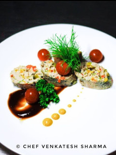 A picture of Chicken Roulade with lemon mustard sauce.