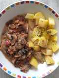Papas con salsa de champiñón