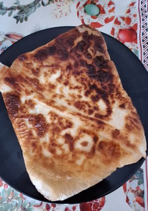 O poză a rețetei Placinta cu branza la tigaie.