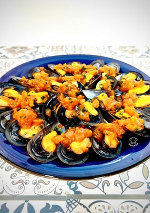 Una foto de Mejillones con salsa vieira