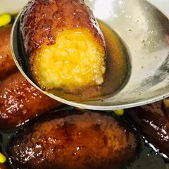 A picture of Homemade khoya gulab jamuns.