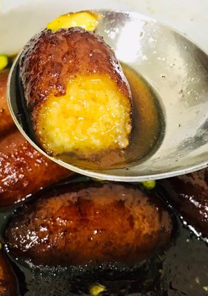 A picture of Homemade khoya gulab jamuns.