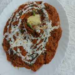 A picture of Butter chicken/dhaba style.