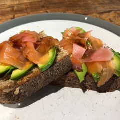 A picture of Smoked salmon, gari and avocado on lightly toasted wholemeal sourdough.