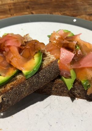 A picture of Smoked salmon, gari and avocado on lightly toasted wholemeal sourdough.
