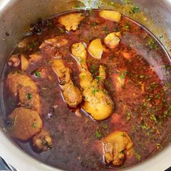 A picture of Malwani chicken curry.