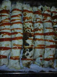 Una foto de Canelones de carne y espinaca!!!
