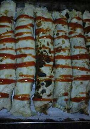 Una foto de Canelones de carne y espinaca!!!